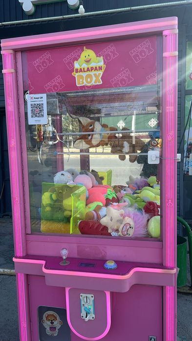 Игровой апарат хватайка