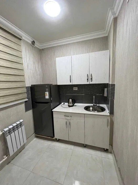 Чиланзар19 ор автомойка 50/50 35м²  в доль дороги 2комнаты Юр адреса