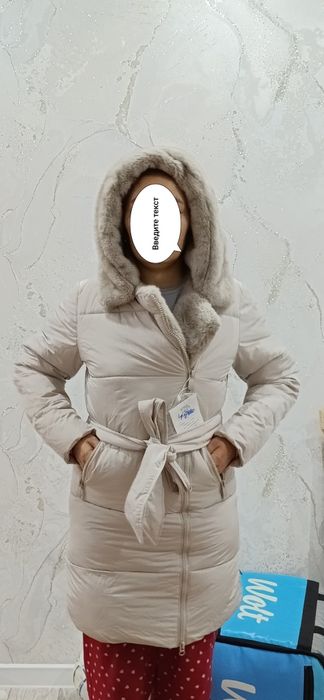 Продам пуховик новый