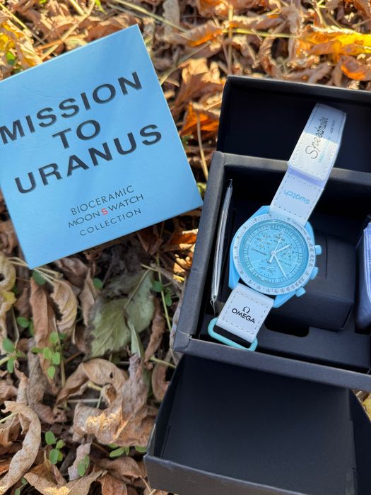 Omega Swatch mission to mercury sun pluto earth venus neptune uranus
