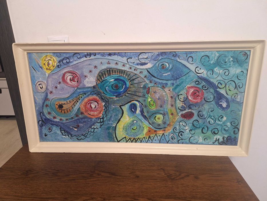 Tablou pictat reprezentand o pictura abstractă.