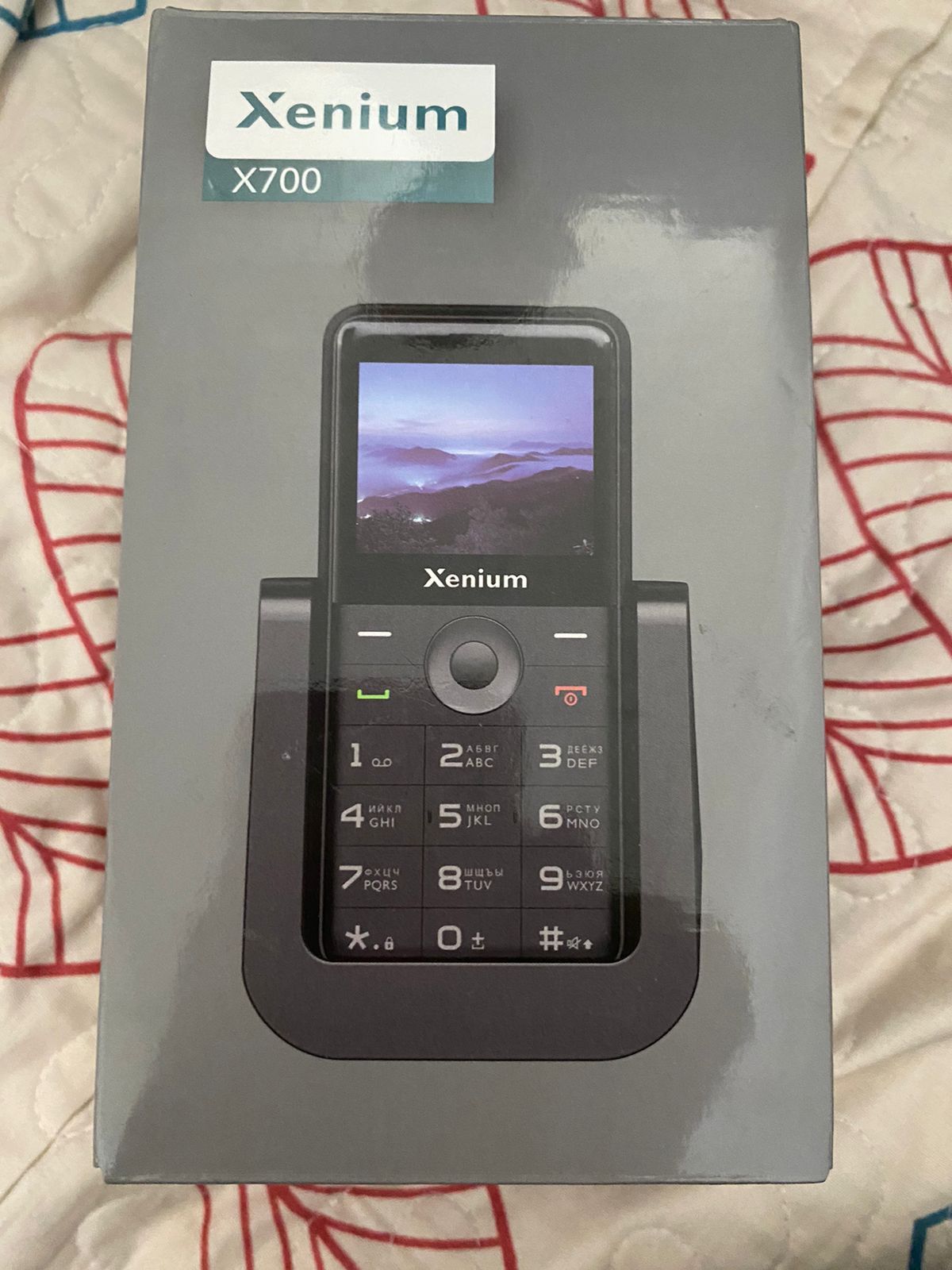 Xenium x 700 телефон