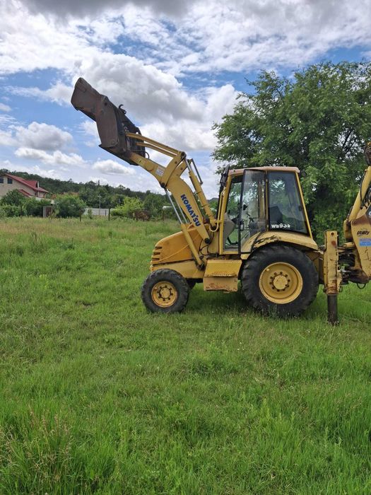 Buldoexcavator Komatsu