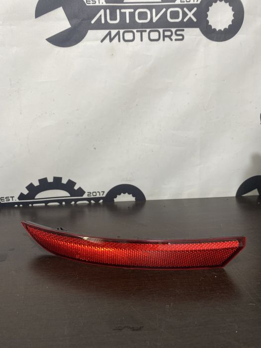 Catadioptru ochi de pisica stanga spate Skoda Octavia 4 sedan berlina