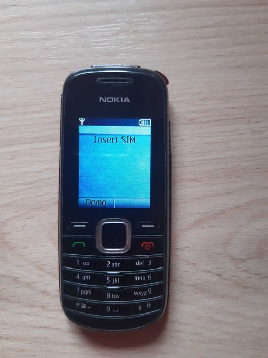 Телефон NOKIA 1661-2, със зарядно устройство