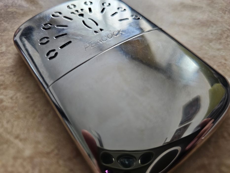 Încălzitor de maini peacock hand