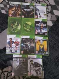 Vând Xbox 360 cu 21 jocuri + volan gaming