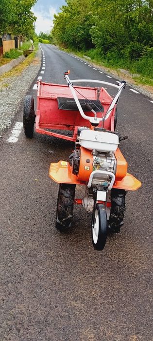 Motocultor cu remorcă și freză aproape nou