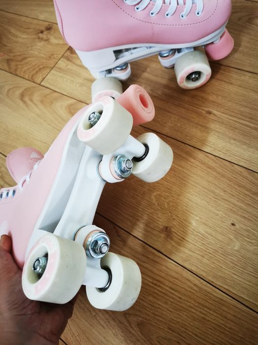 Patine cu rotile Oxelo roz