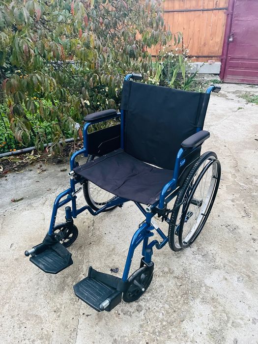 Scaun cu rotile in stare buna