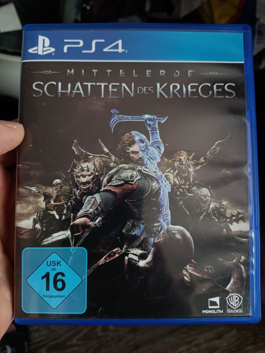Игри за Wii ,Play Station 2 и 3 и опаковката за една PS 4 игра.