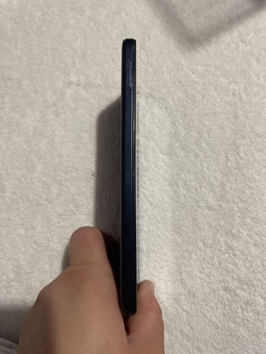 Vând telefon moto aproape nou