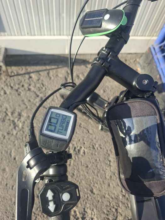 vând bicicletă electrica Raleigh