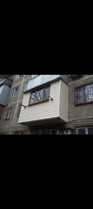 Обшивка балконов и лоджий сайдингом