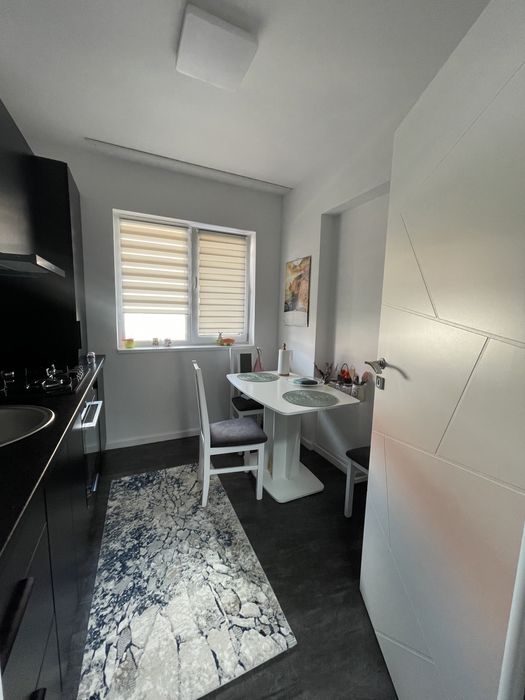 Garsoniera si loc de parcare si curte