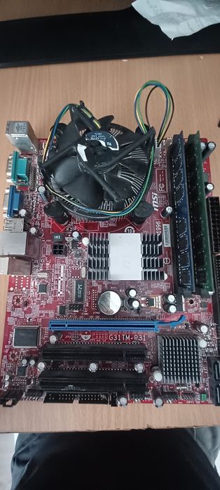 Kit MSI G31TM-P31 cu intel core 2 duo e7400 si geforce 210