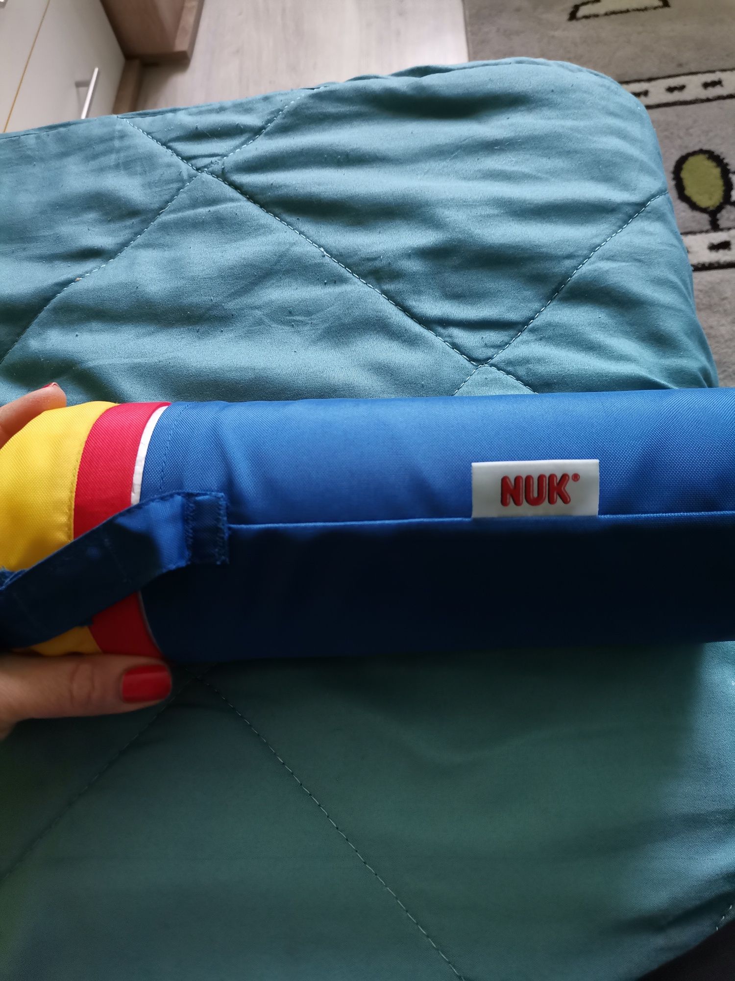 Термоопаковка за шишета на NUK за задържане топлината на водата