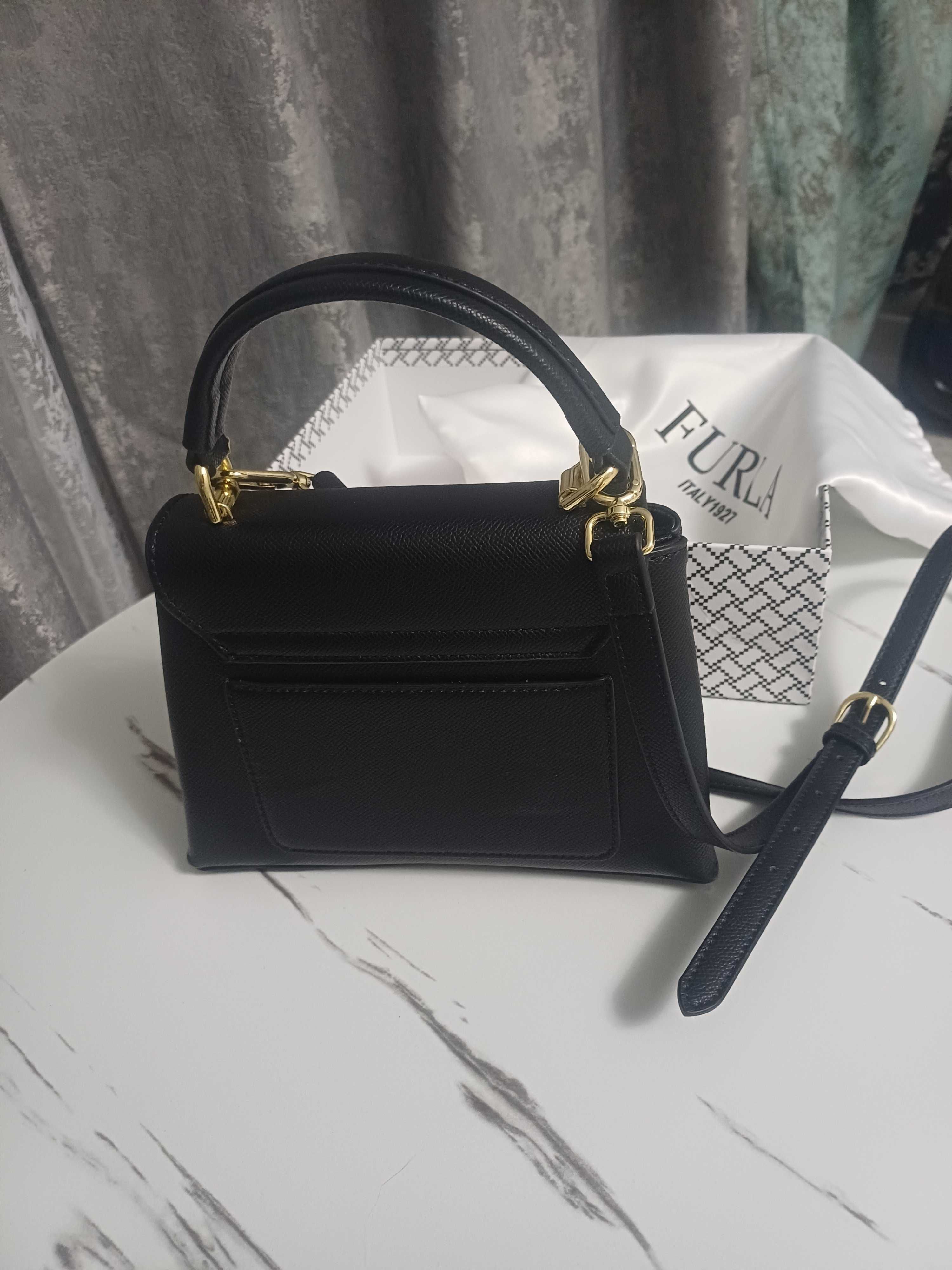 Продам женскую сумку Furla