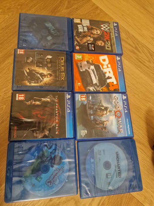 PlayStation  4 cu  2 manete si 8 jocui