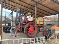 Tractor cu instalație de stropit