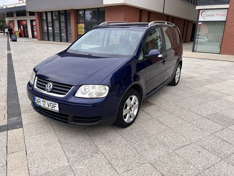 Vand sau schimb vw turan dsg 7 locuri