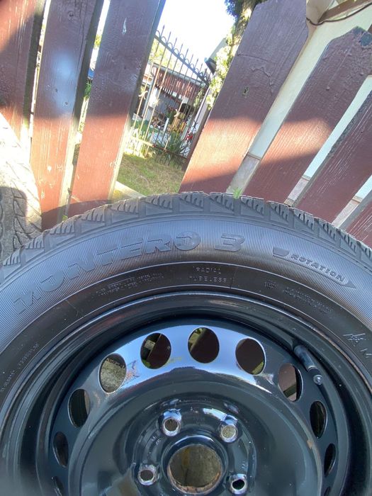 Set 4 cauciucuri iarna Fulda 195/65 R15 cu jante + capace Volkswagen