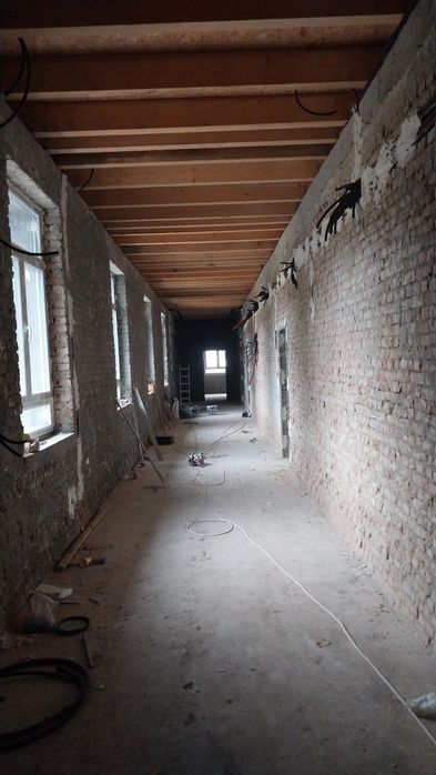 Execut lucrări în construcții.