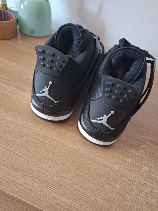 Jordan 4 black canvas