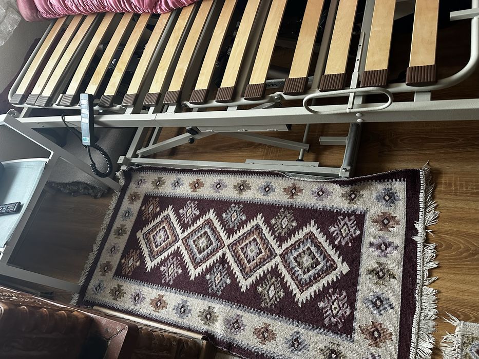 Pat electric cu telecomanda pt persoane cu dizabilitati.