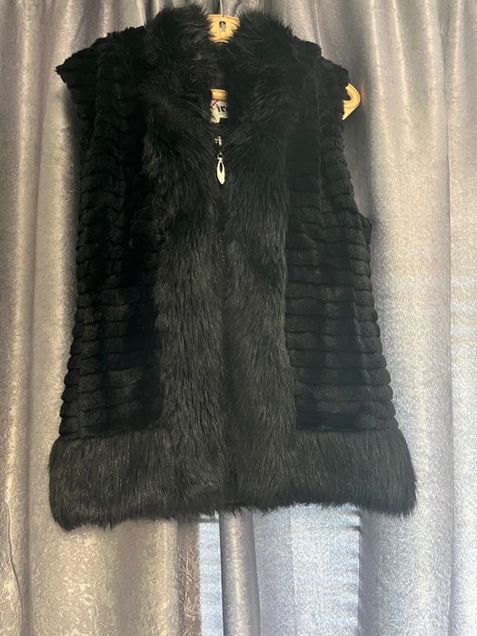 Топъл пухен елек