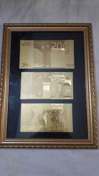 Золотые банкноты Евро в рамке. Оформление из трёх штук