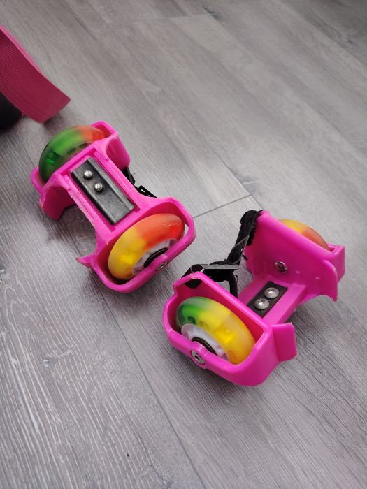 Role oxelo cu geanta transport roz