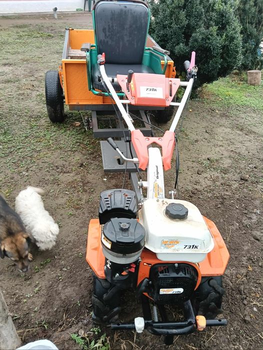 Vând motosapa cu remorca