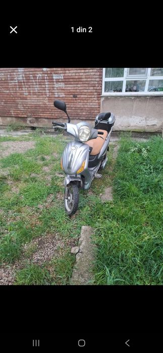 Vând scuter  electrica mai