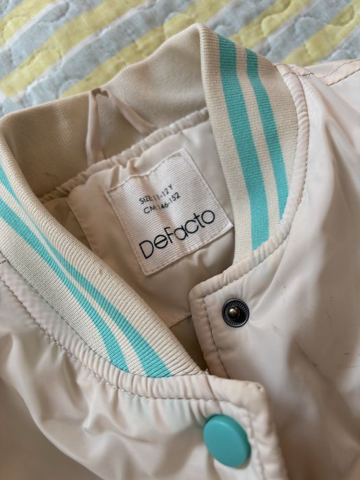 Куртка на девочку,в отличном состоянии.Размер 11-12 лет.