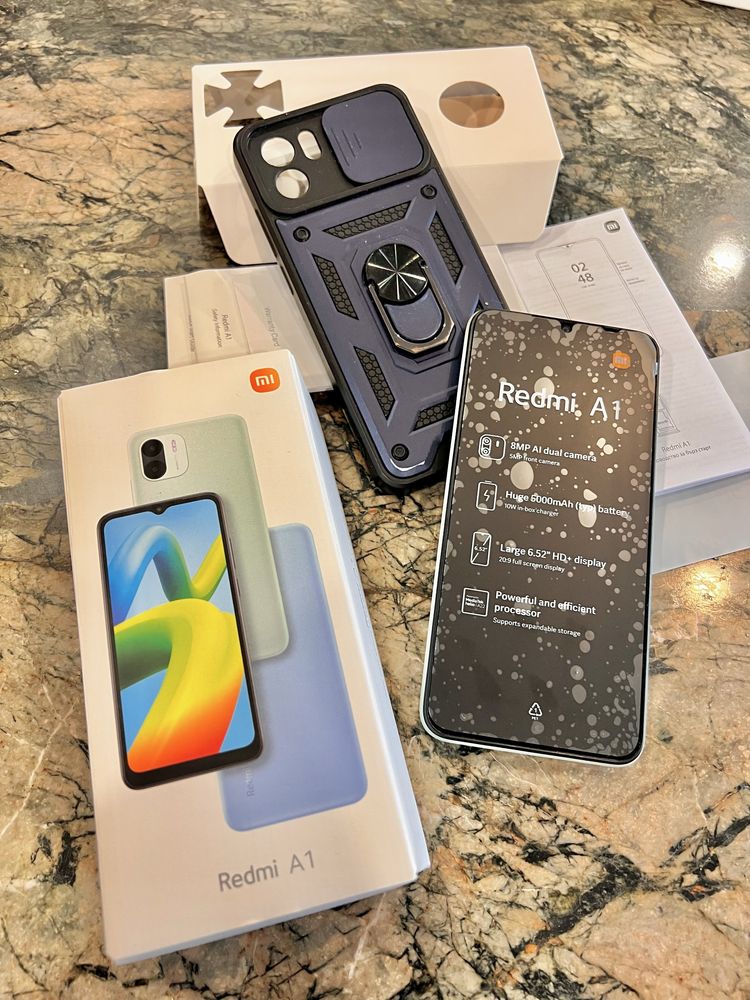 Xiaomi redmi A1 перфектен с подарък кейс