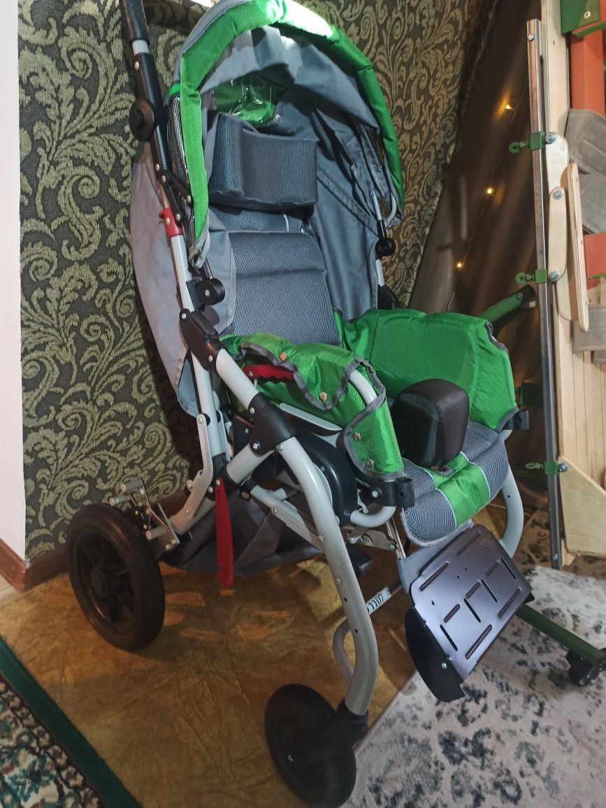 Инвалидная коляска для детей с диваном ДЦП
