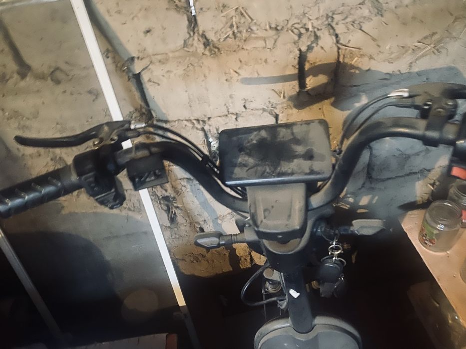 Электроскутер  t