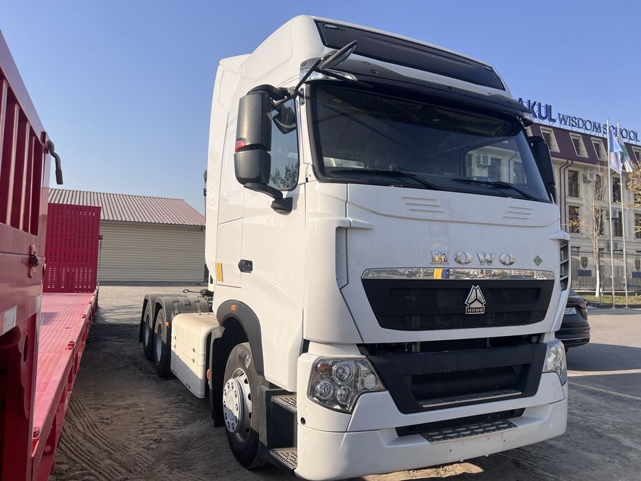 Тягач. HOWO. T7H ва Трал 17.5 м. Янги.