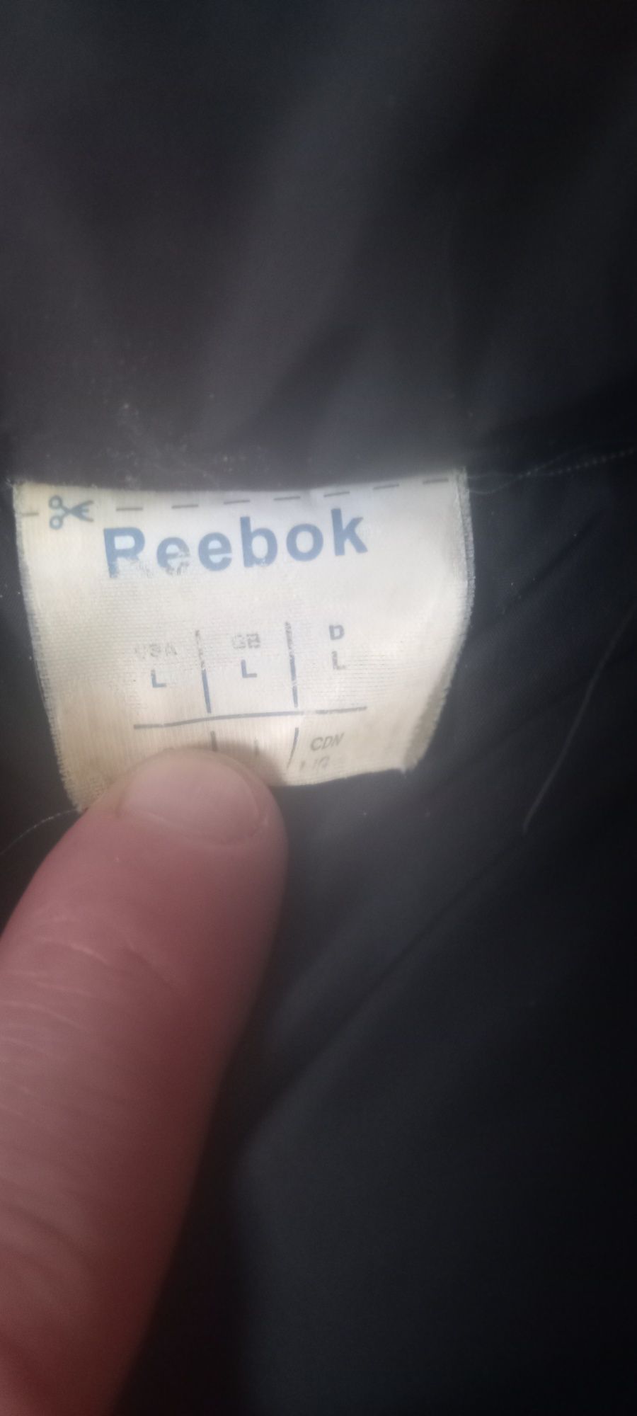 Продам пуховик марки Reebok