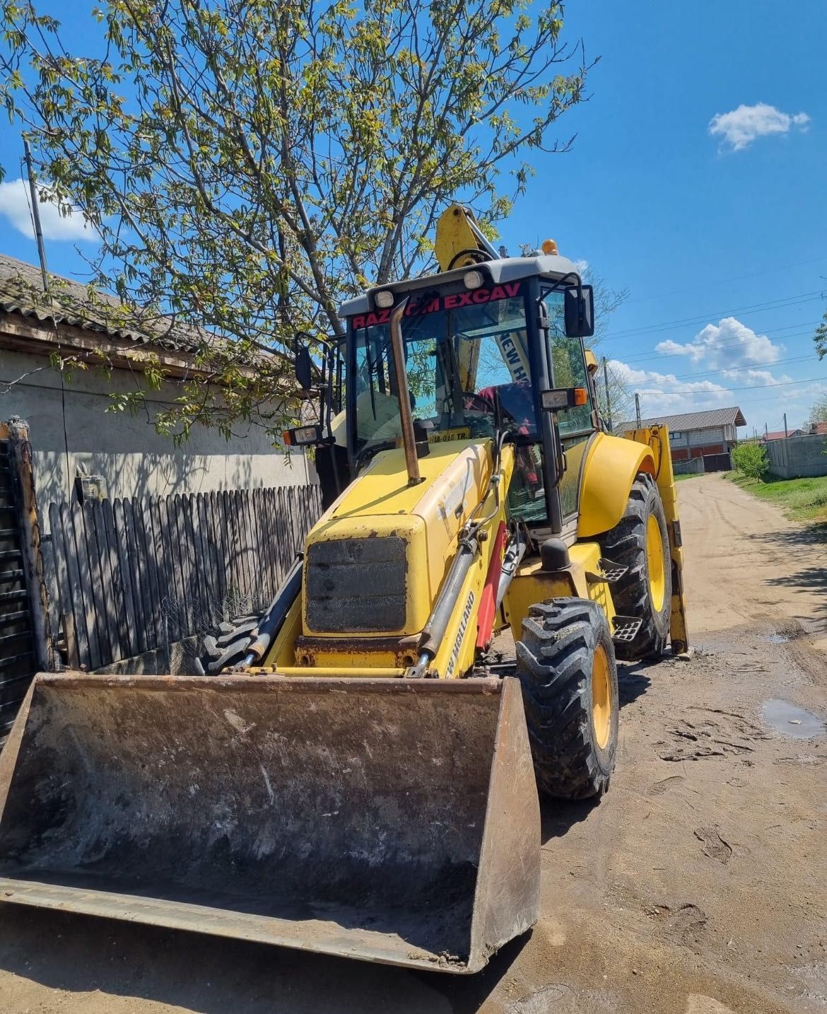 Buldoexcavator NH