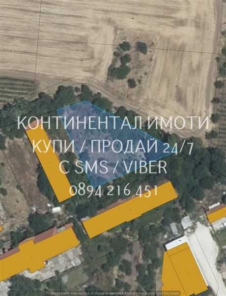 код 63095. Голям парцел 1600м2, ъглов до път, комуникации