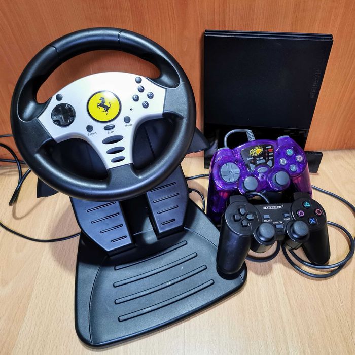 PS2 cu volan si pedale + 50 jocuri + 2 manete. Raspund doar telefonic.