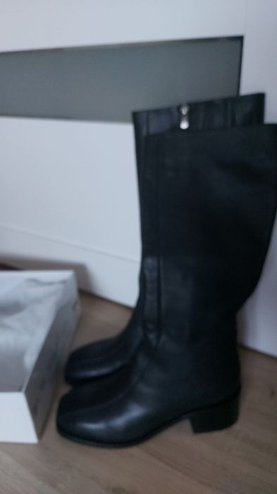 Продаю новые сапоги