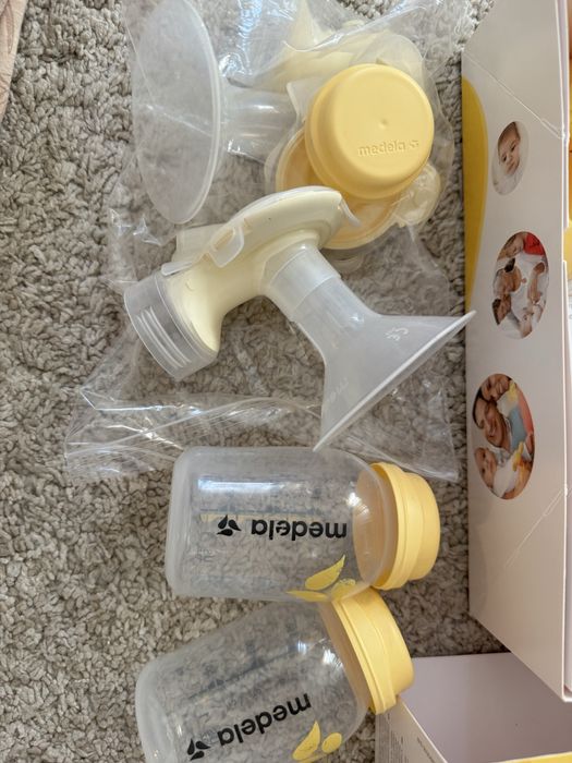 Помпа за кърма MEDELA Swing Maxi + Calma - двойна