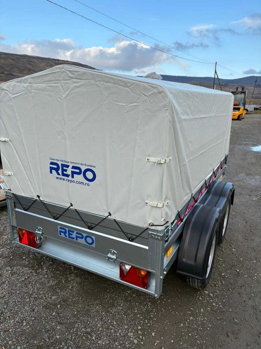 Remorca 2 axe 750 kg,235X124X32 TOTUL INCLUS,produs in RO.