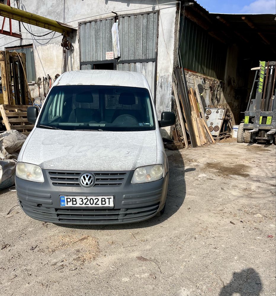 WV Caddy 2.0 бензин/метан