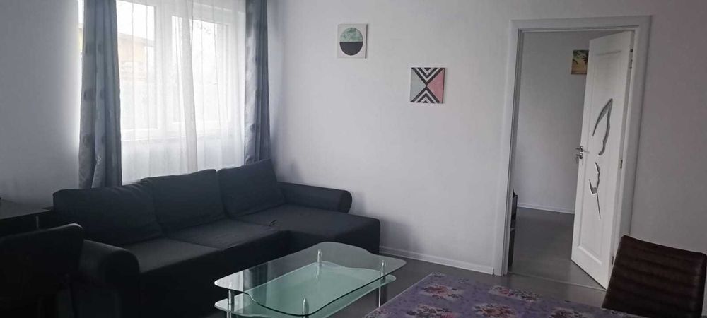 Inchiriez ap 2 camere mobilat/utilat complet,curte proprie-Sanpetru