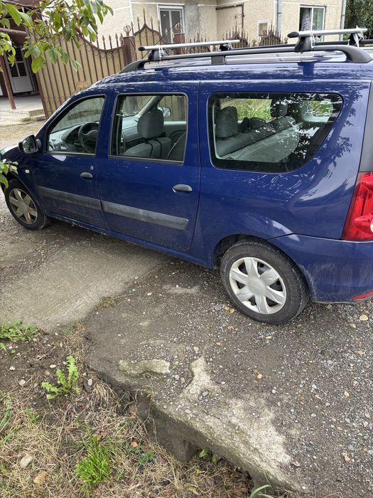 vând dacia logan
