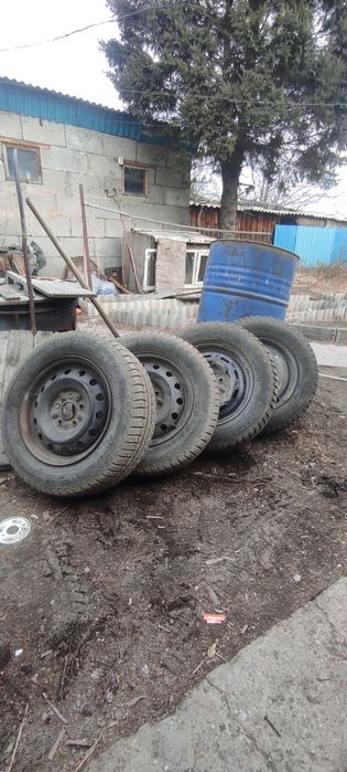 Бу шины с дисквм штамповыный